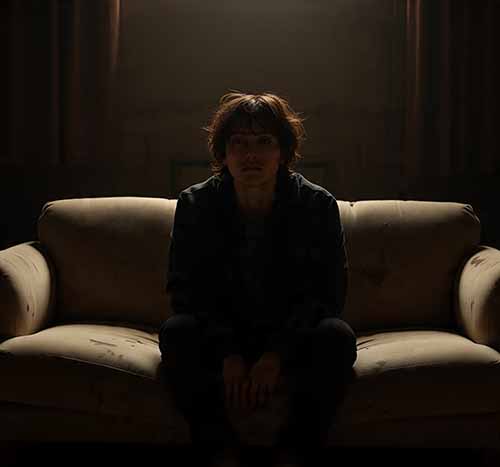 person feeling emotionally numb on a quiet evening